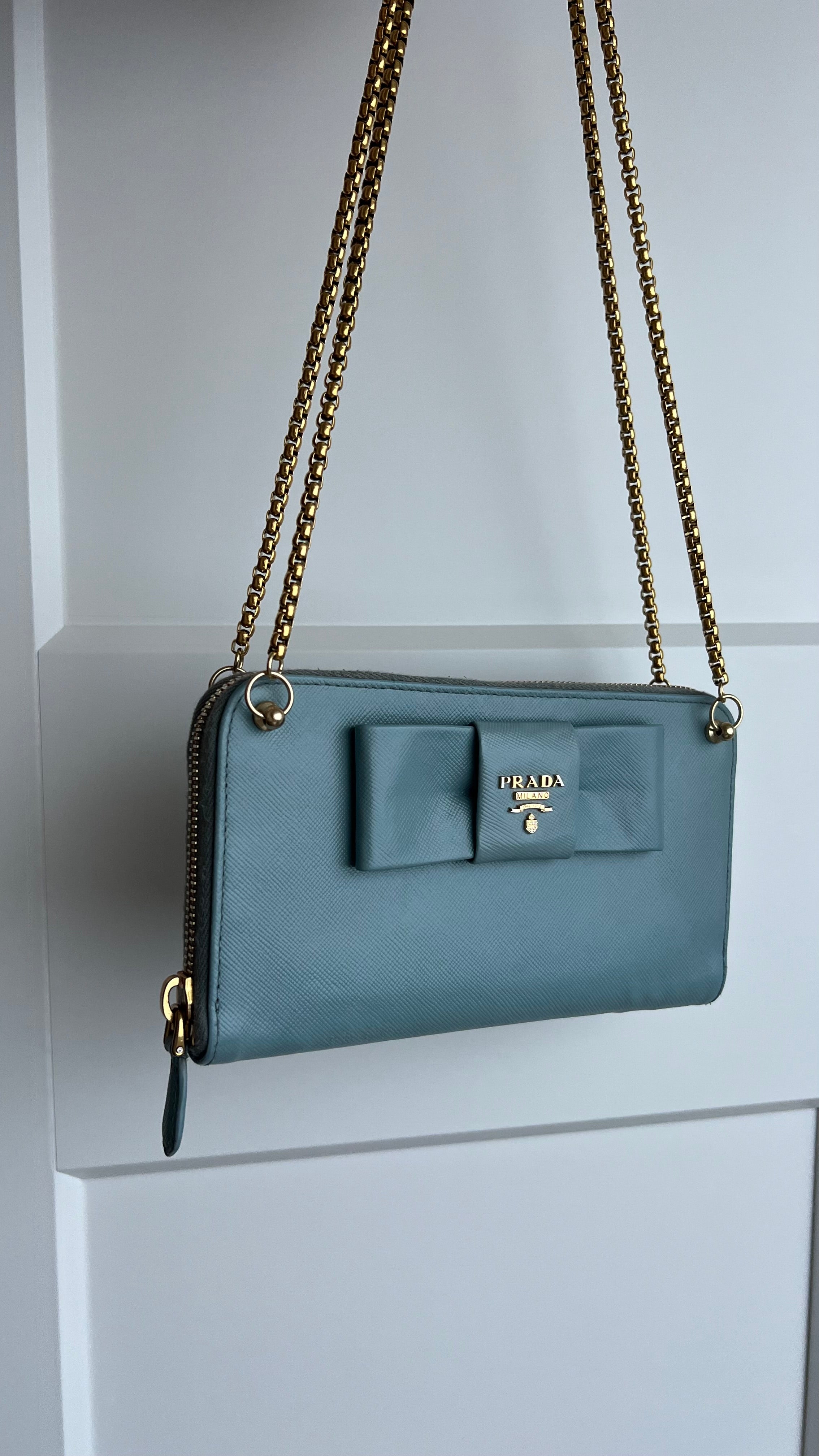 Prada saffiano blue ribbon