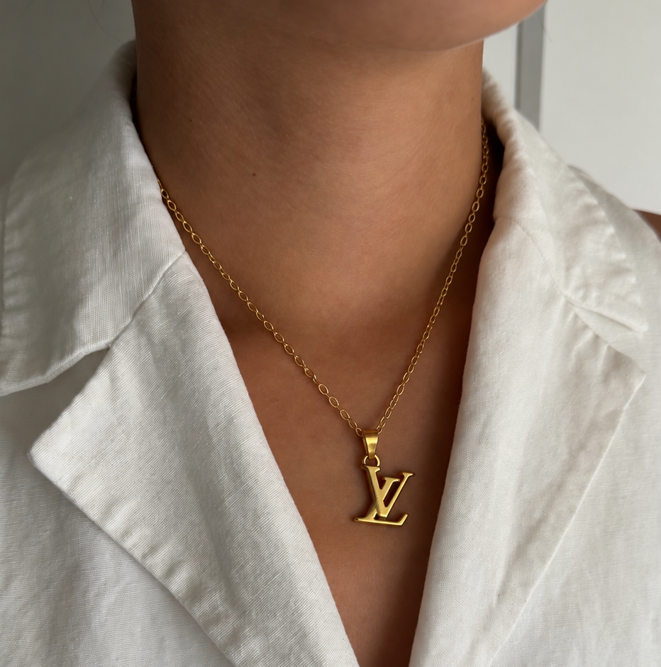 Vintage Louis Vuitton sleutelhanger LV bedel | Ketting