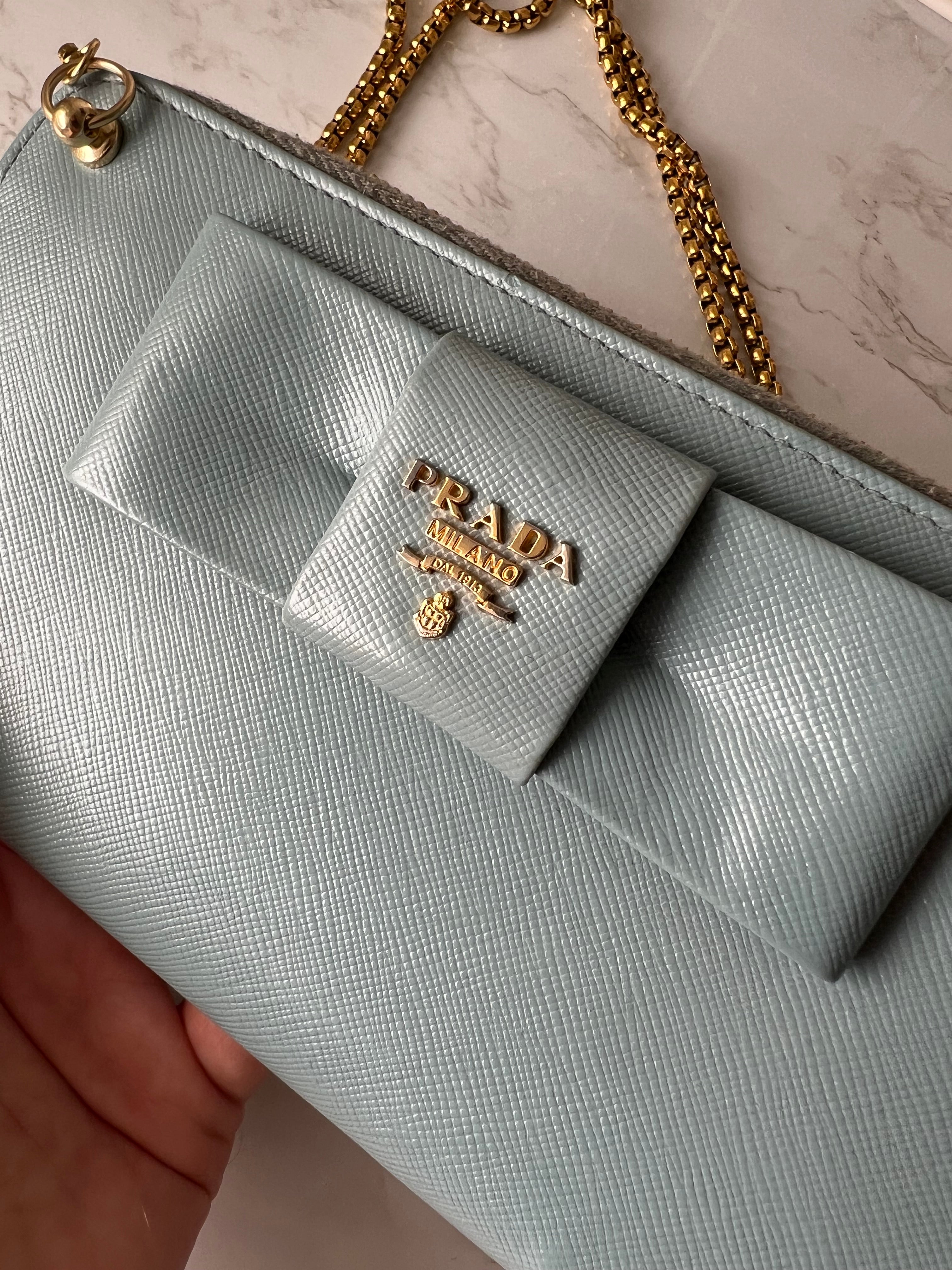 Prada saffiano blue ribbon