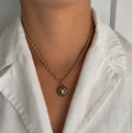 Vintage Louis Vuitton sleutelhanger bedel rond lv | Ketting