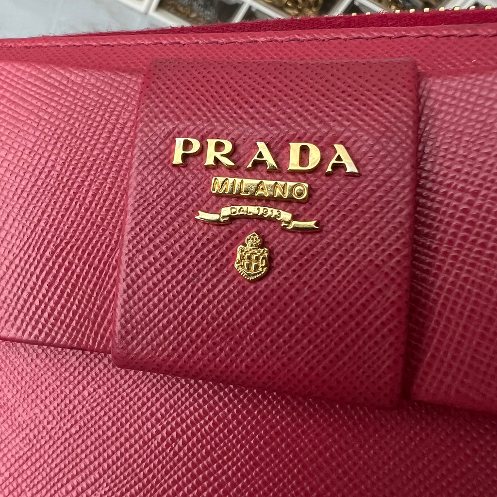 Prada saffiano pink ribbon