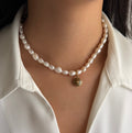 Vintage Louis Vuitton sleutelhanger bedel rond | Zoetwater parel ketting