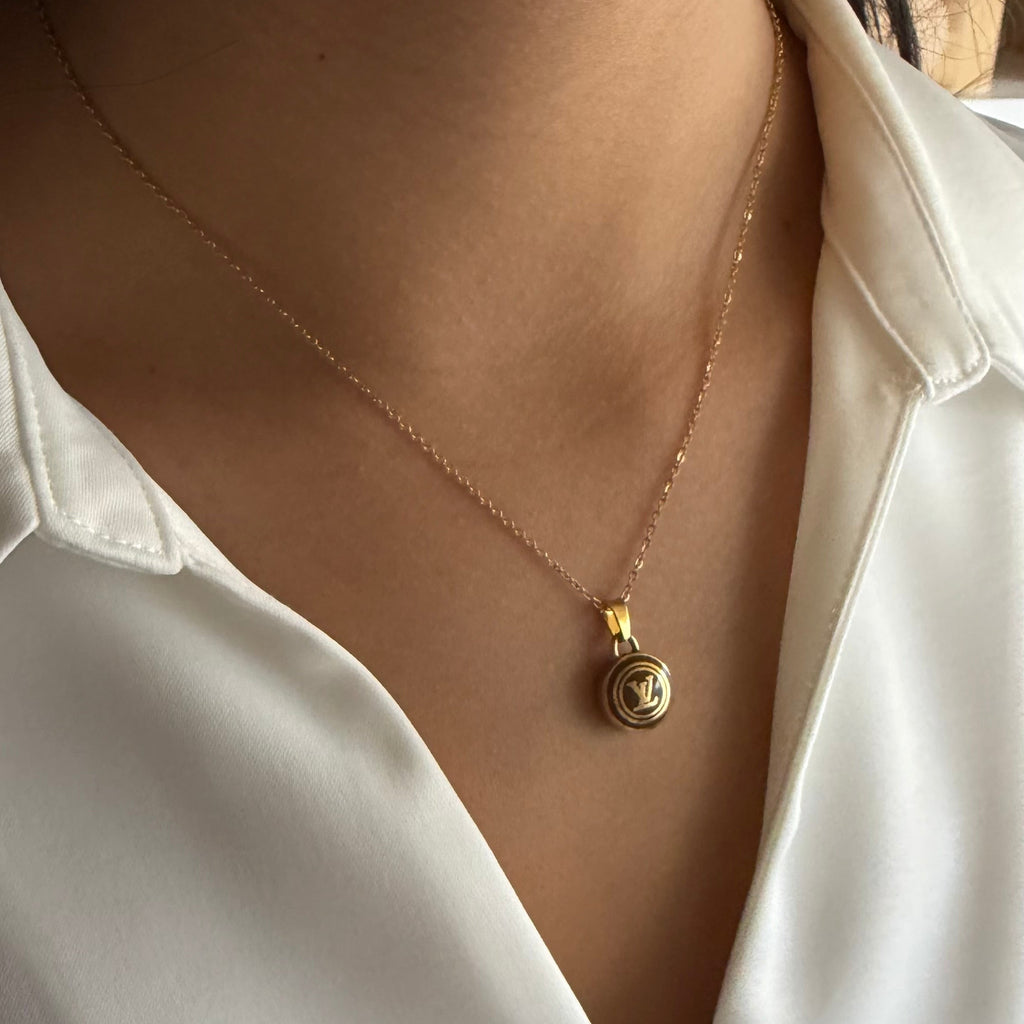 Vintage Louis Vuitton sleutelhanger bedel rond bruin | Ketting