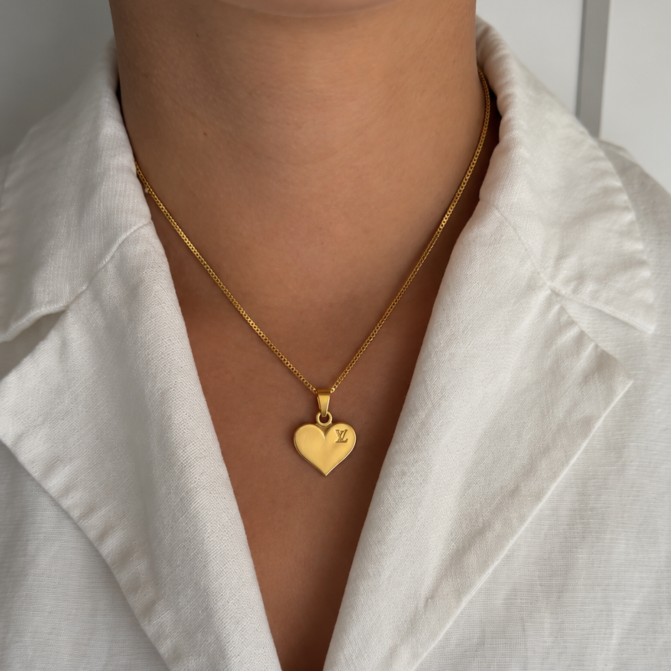 Vintage Louis Vuitton sleutelhanger hartjes bedel | ketting