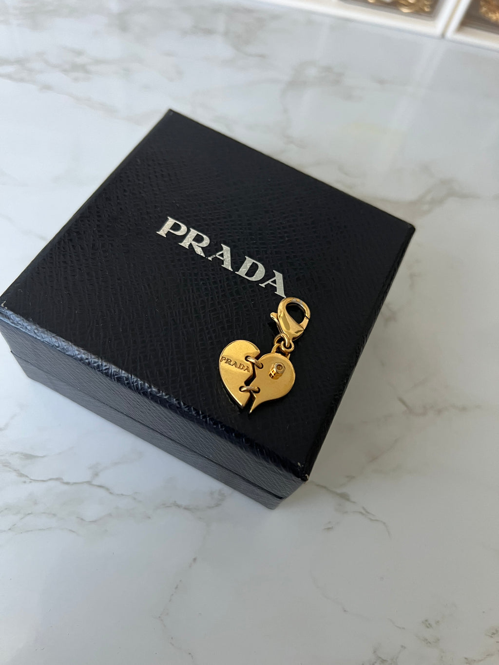 Prada gebroken hart bedel | Ketting