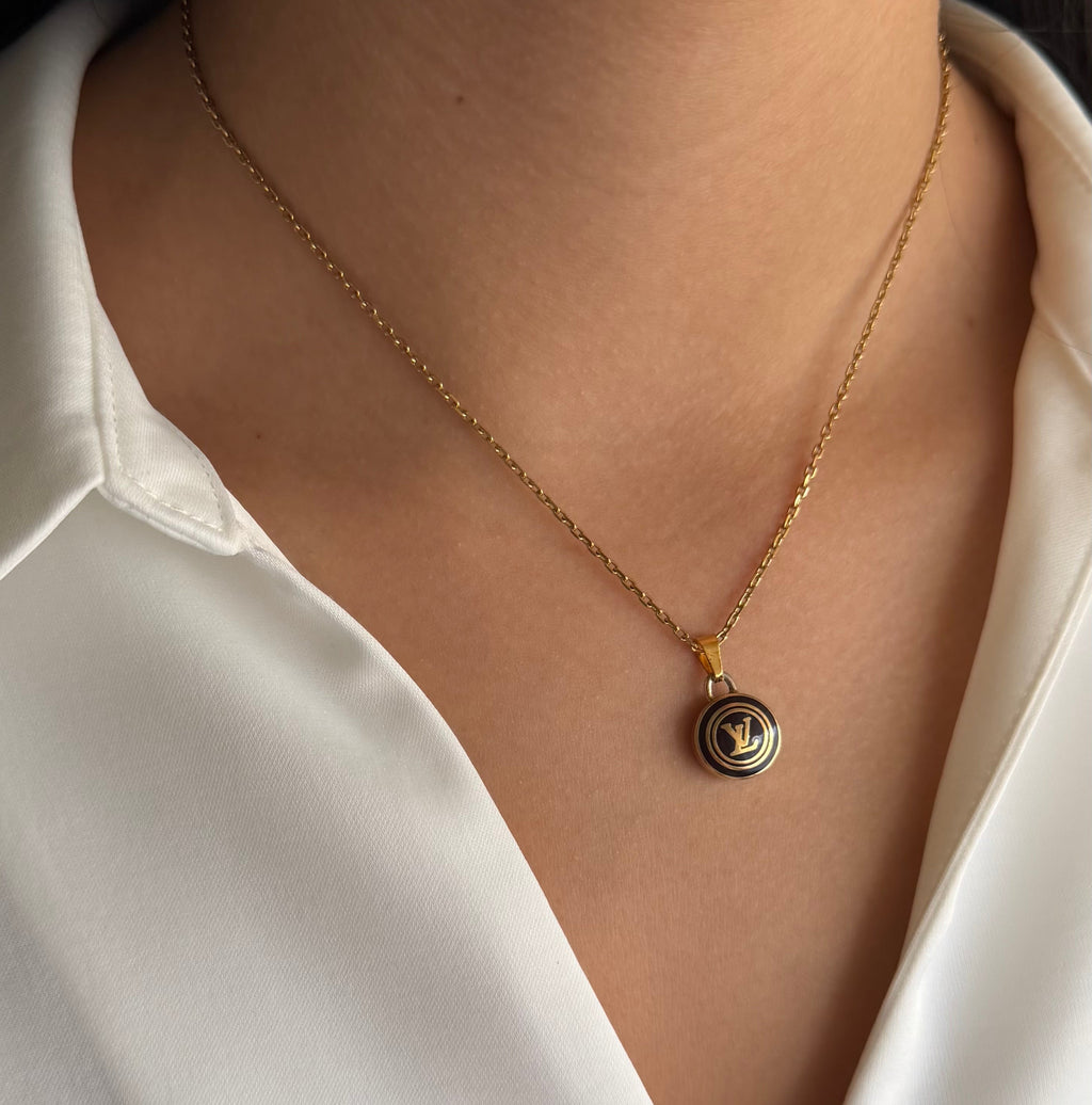 Vintage Louis Vuitton sleutelhanger bedel rond zwart | Ketting