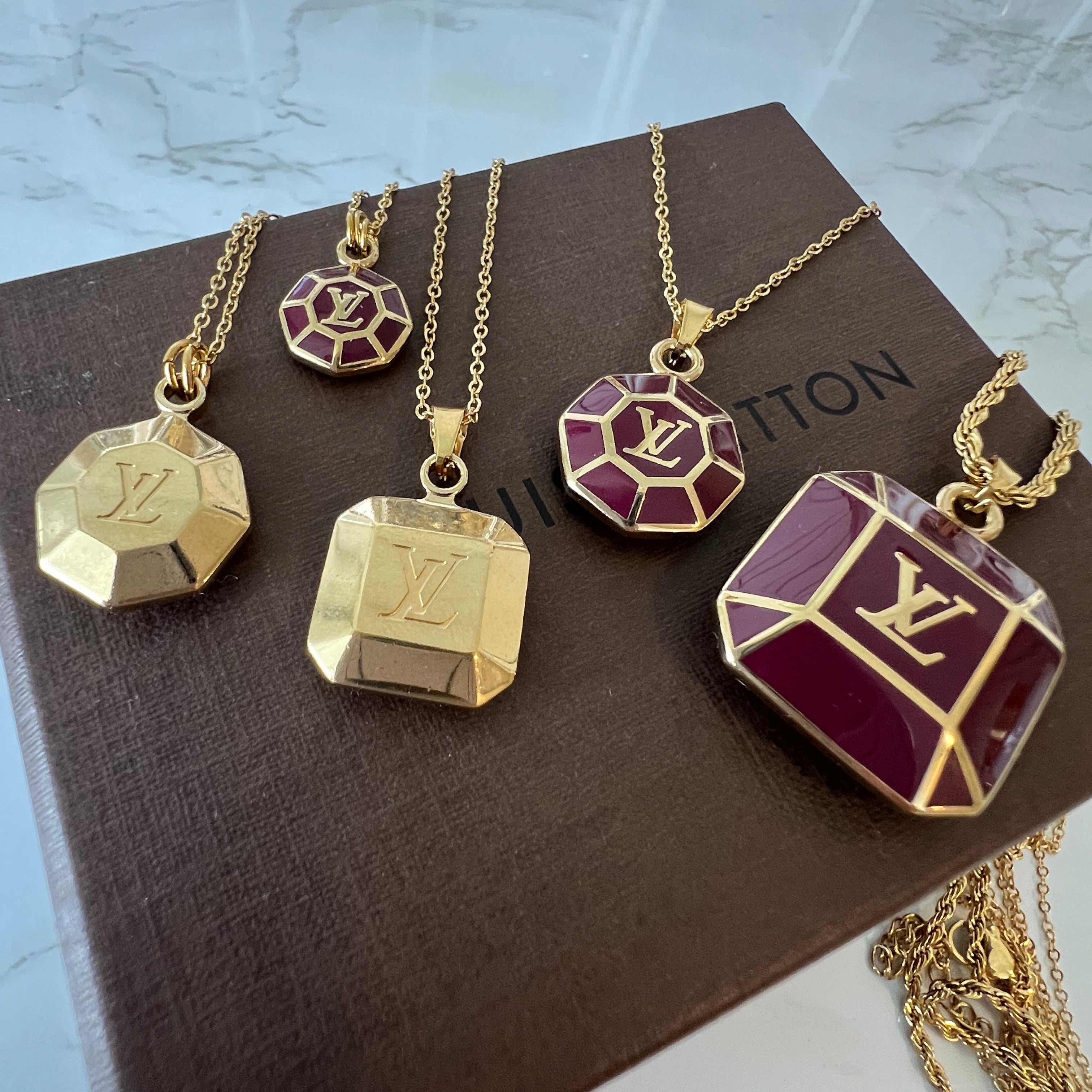 Louis Vuitton sleutelhanger bedel| ketting