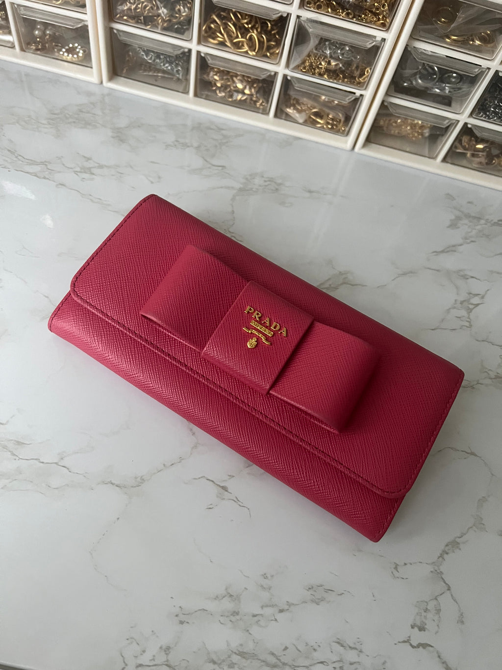 Prada saffiano pink ribbon