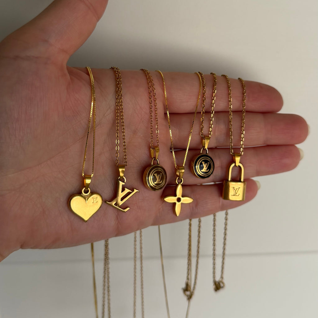 Vintage Louis Vuitton sleutelhanger hartjes bedel | ketting
