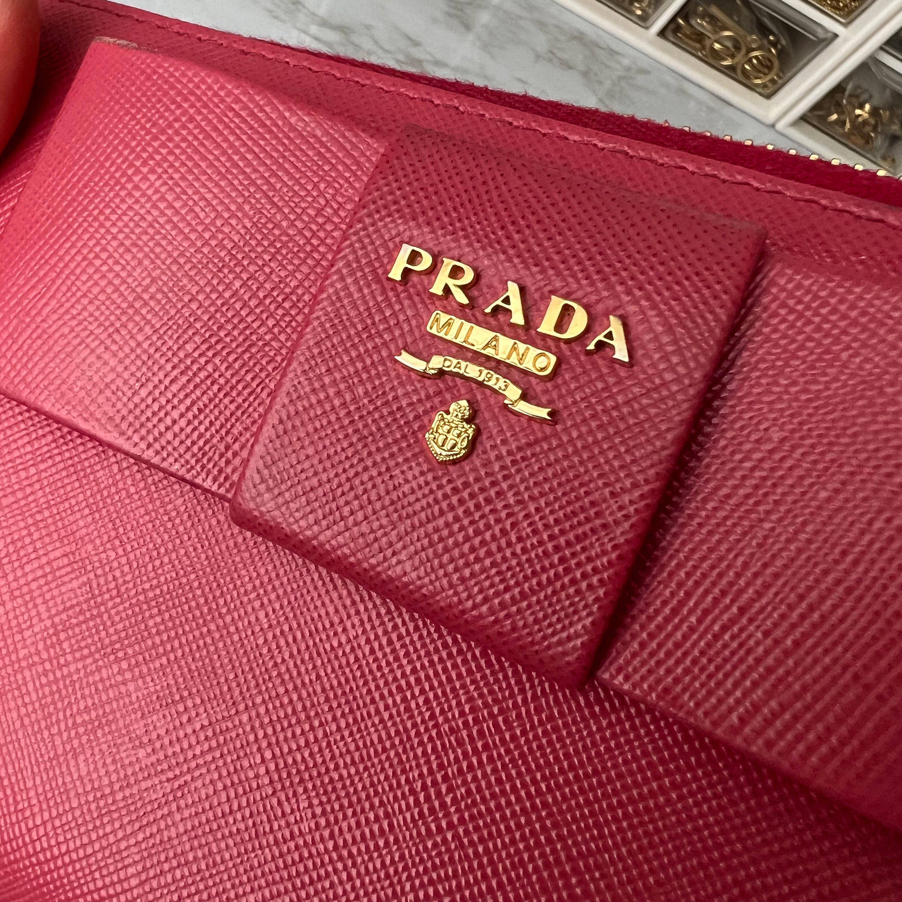 Prada saffiano pink ribbon